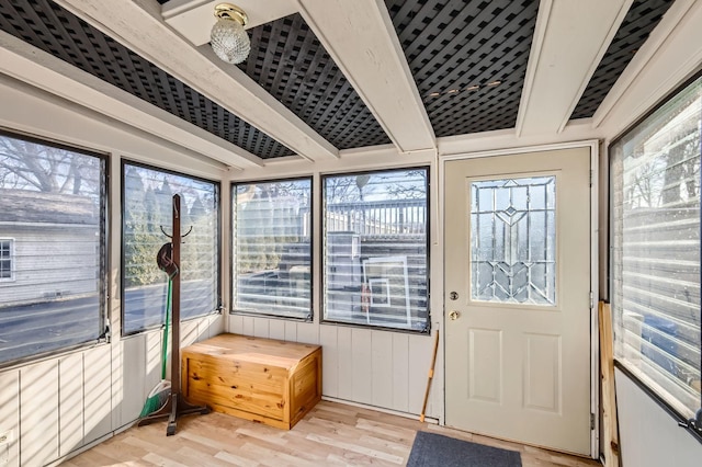 sunroom / solarium with beam ceiling