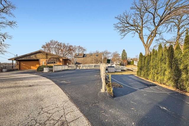 view of street featuring a gate