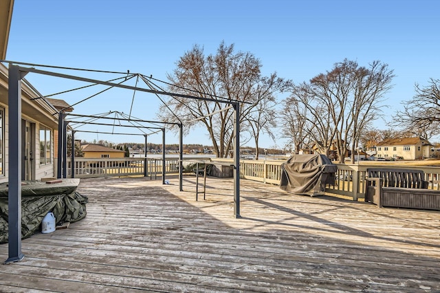 wooden deck with area for grilling