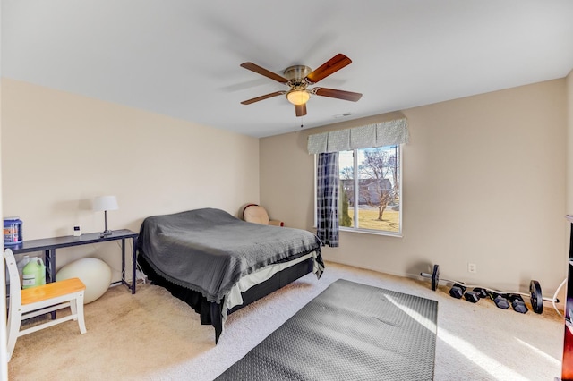 carpeted bedroom featuring visible vents and ceiling fan