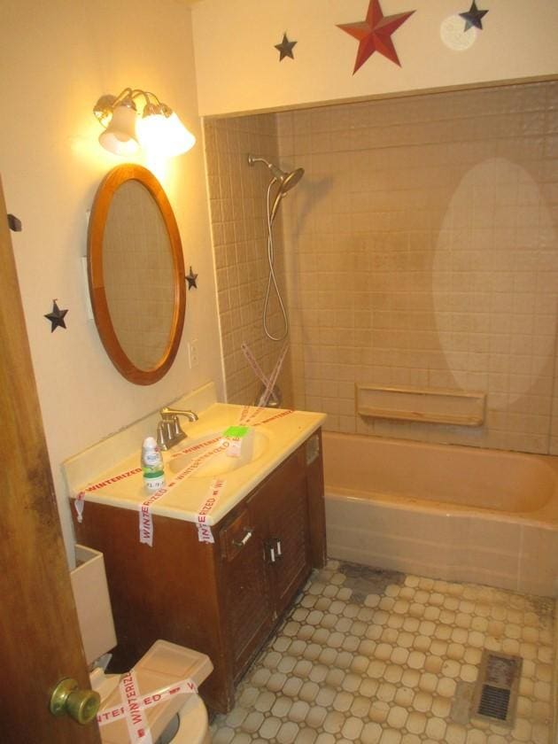 full bath with visible vents, shower / washtub combination, and vanity