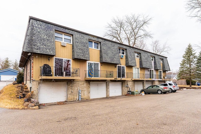 view of building exterior featuring a garage