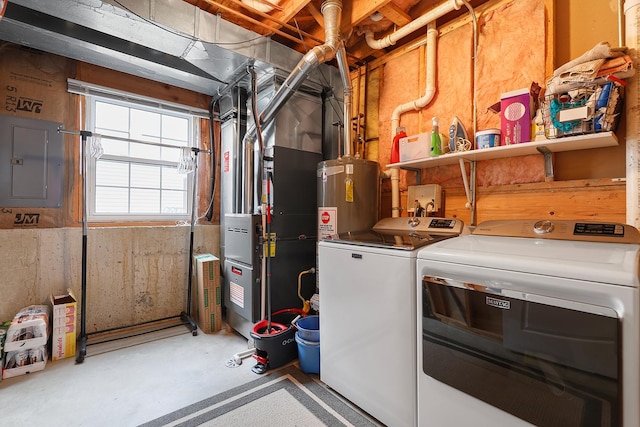 washroom with washer and clothes dryer, heating unit, water heater, laundry area, and electric panel