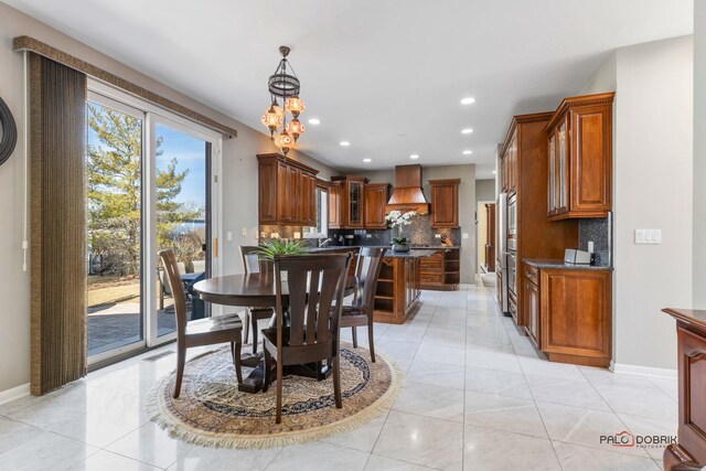 dining room with recessed lighting, a chandelier, baseboards, and light tile patterned flooring