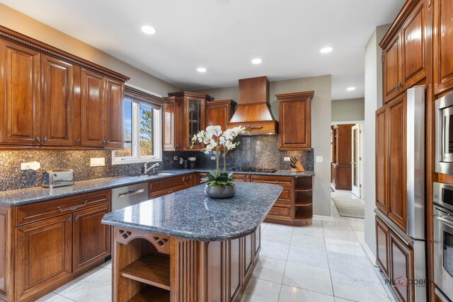 kitchen featuring backsplash, a center island, premium range hood, appliances with stainless steel finishes, and open shelves