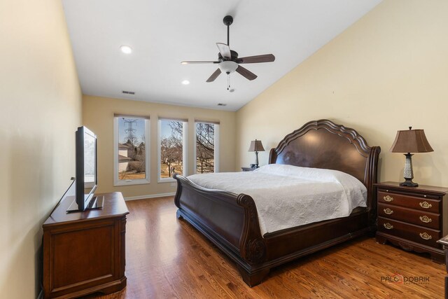 bedroom with visible vents, ceiling fan, vaulted ceiling, recessed lighting, and wood finished floors