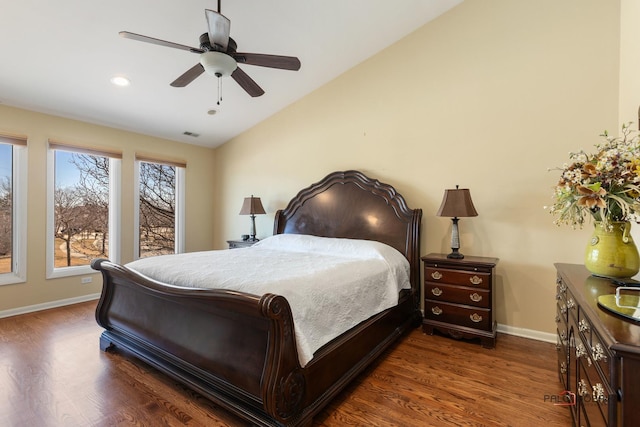 bedroom with visible vents, baseboards, vaulted ceiling, recessed lighting, and wood finished floors