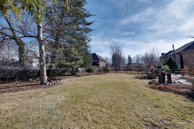 view of yard with fence