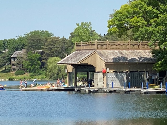 dock area with a water view