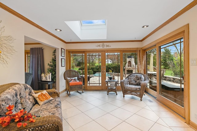 sunroom with a skylight, plenty of natural light, and french doors