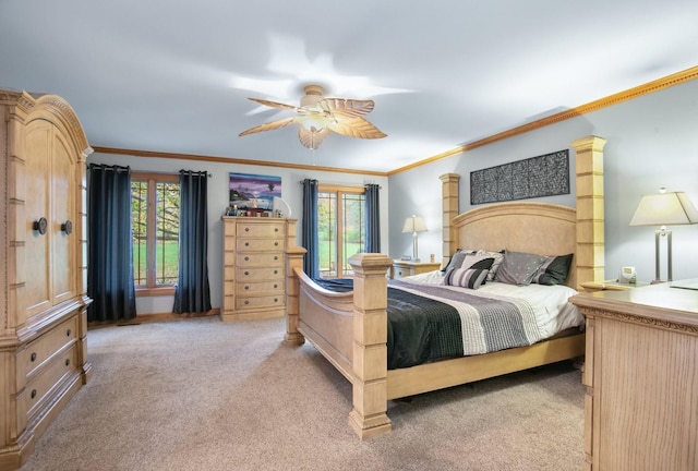 bedroom with carpet floors, multiple windows, and ornamental molding