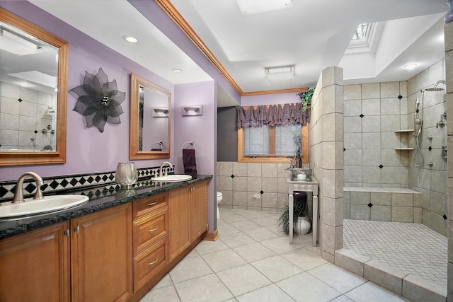 bathroom featuring a sink, tile walls, and tile patterned floors