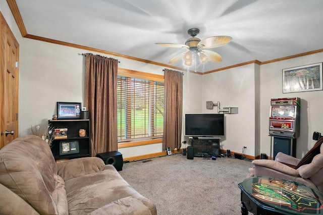 living area featuring carpet floors, baseboards, ornamental molding, and ceiling fan