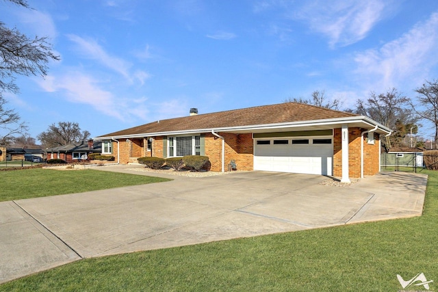 ranch-style house with an attached garage, driveway, a front lawn, and brick siding