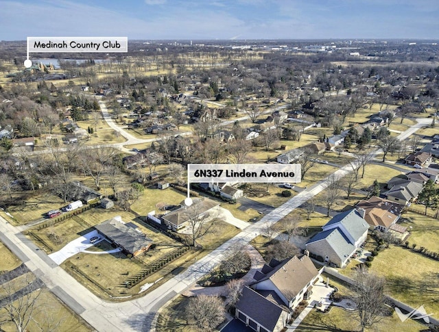 birds eye view of property with a residential view