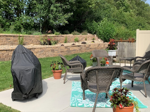 view of patio / terrace featuring fence and area for grilling