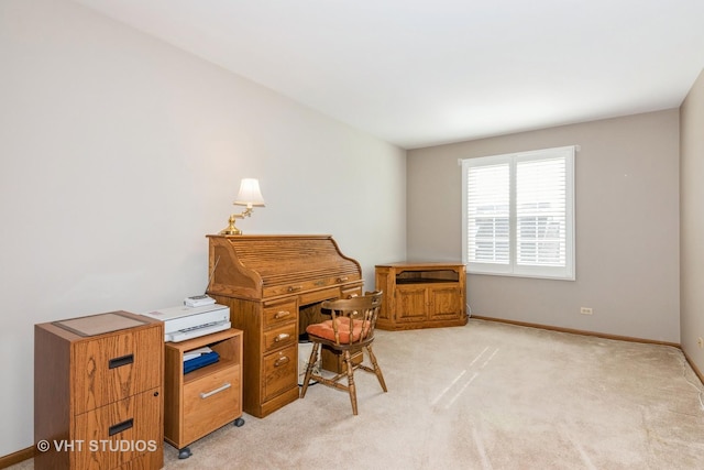 office area with light colored carpet and baseboards