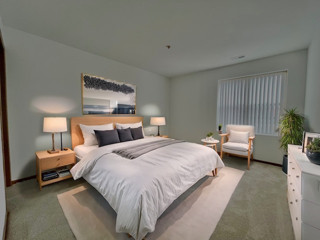 bedroom featuring carpet floors, visible vents, and baseboards