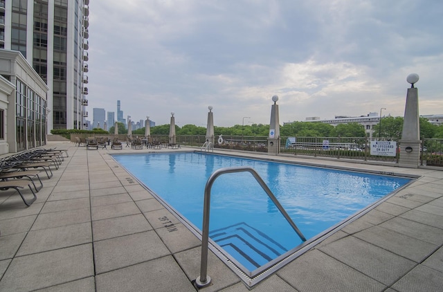 1322 S Prairie Ave Unit 1413, Chicago, IL 60605 - community pool featuring a patio area and a view of city