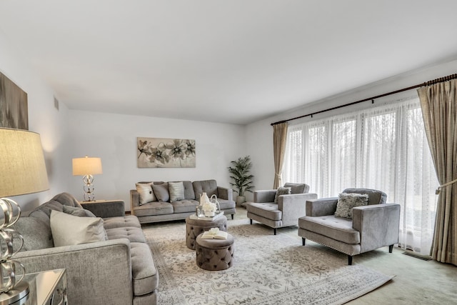 carpeted living room featuring visible vents