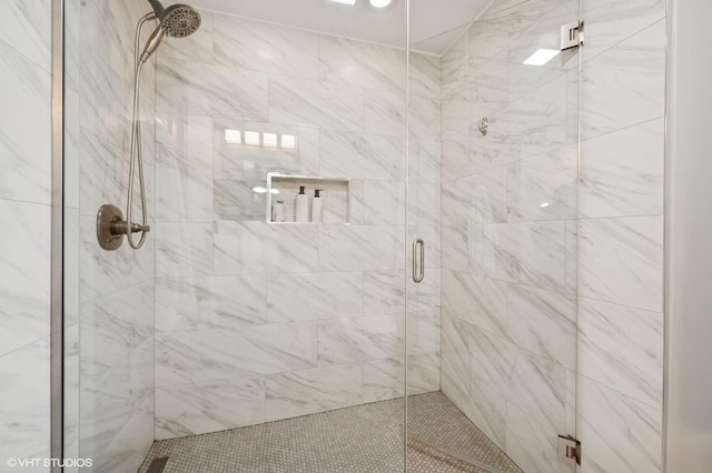 full bathroom with a shower stall