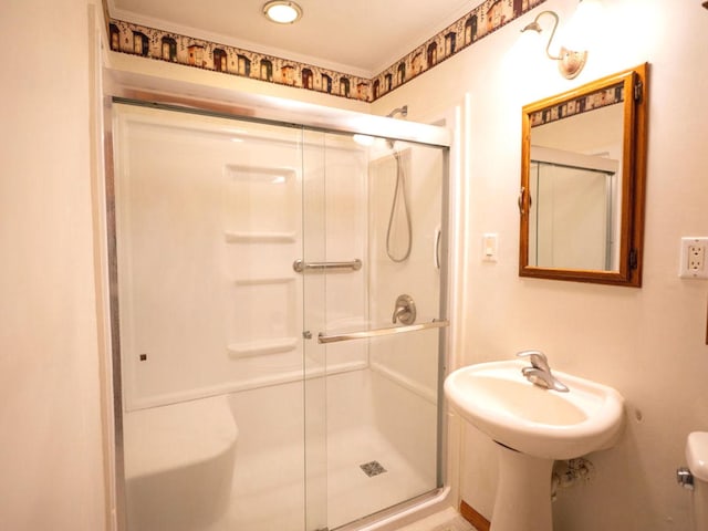 full bath with a shower stall and toilet