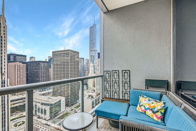 balcony featuring a view of city