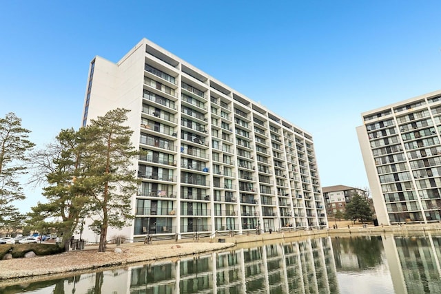 view of building exterior featuring a water view