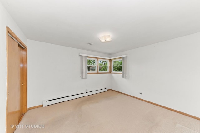 6938 W Jonquil Ter, Niles, IL 60714 - unfurnished bedroom featuring a baseboard radiator, carpet flooring, baseboards, and a closet