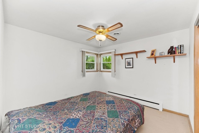 6938 W Jonquil Ter, Niles, IL 60714 - bedroom featuring a baseboard radiator, carpet flooring, a ceiling fan, and baseboards