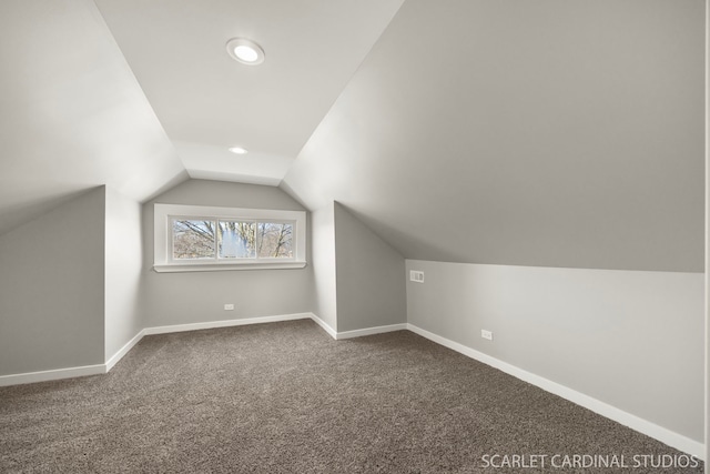 bonus room with recessed lighting, baseboards, carpet, and vaulted ceiling