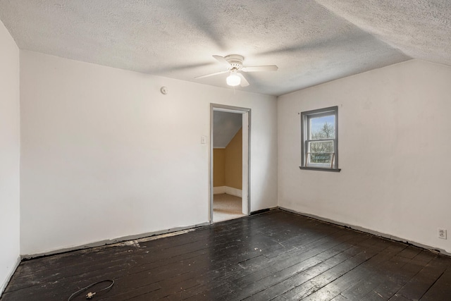 unfurnished room featuring ceiling fan and hardwood / wood-style floors