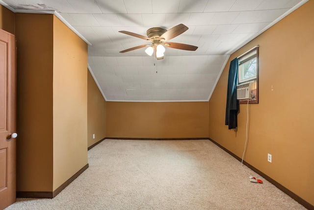 bonus room featuring a ceiling fan, lofted ceiling, baseboards, and carpet floors