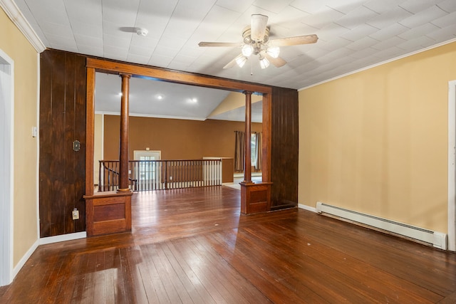 empty room with ceiling fan, baseboards, a baseboard radiator, vaulted ceiling, and wood-type flooring