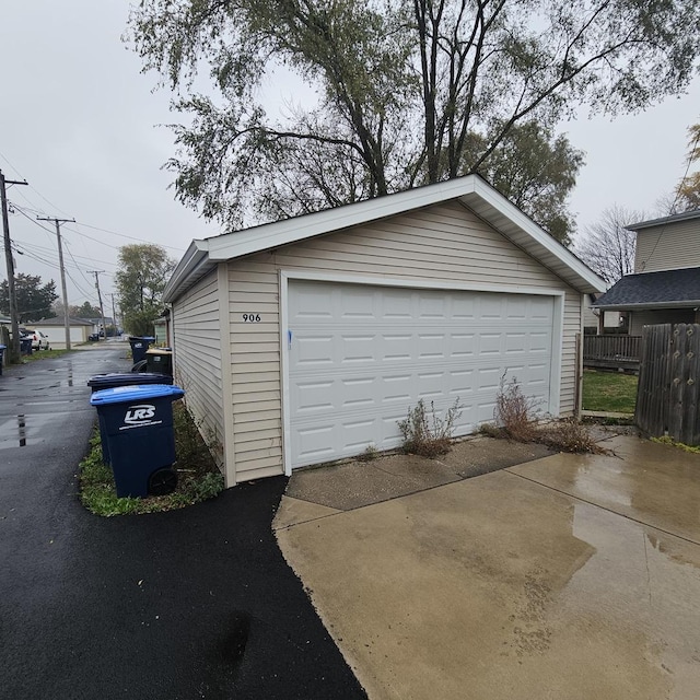 detached garage with fence