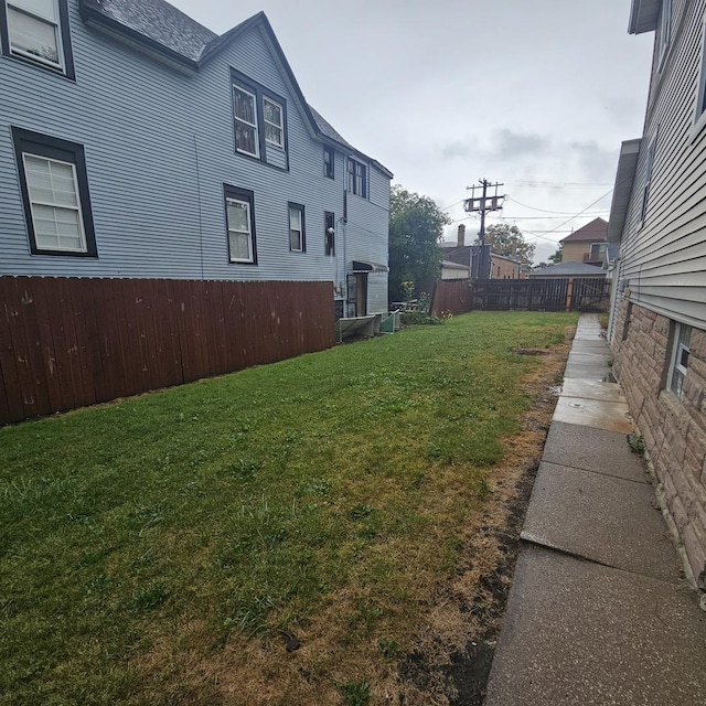 view of yard featuring fence