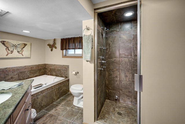 bathroom featuring toilet, a garden tub, a shower stall, and visible vents