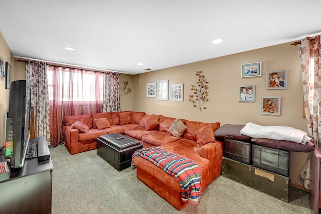 living room with carpet floors and recessed lighting