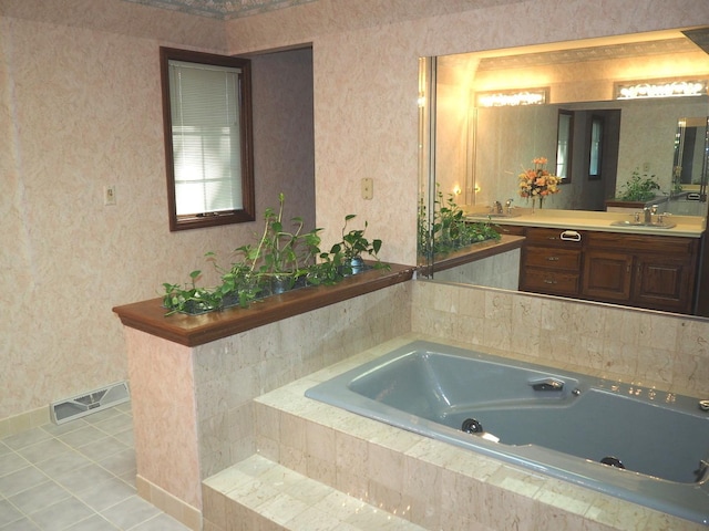 full bathroom featuring vanity, visible vents, tile patterned floors, a whirlpool tub, and wallpapered walls