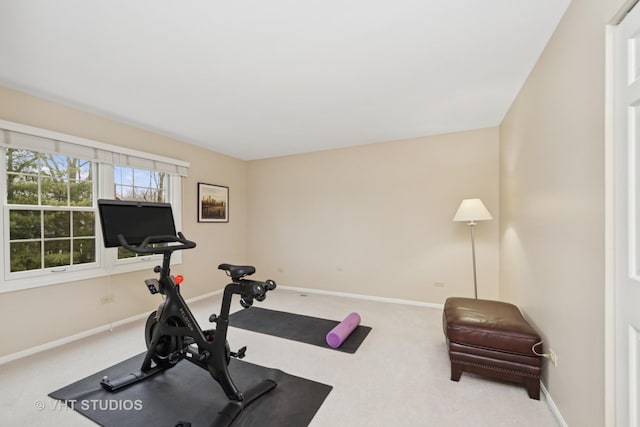 workout area with carpet and baseboards