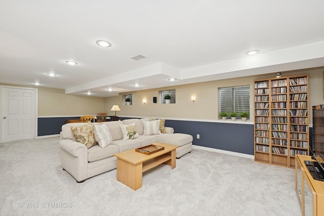 living area with baseboards, visible vents, carpet flooring, and recessed lighting