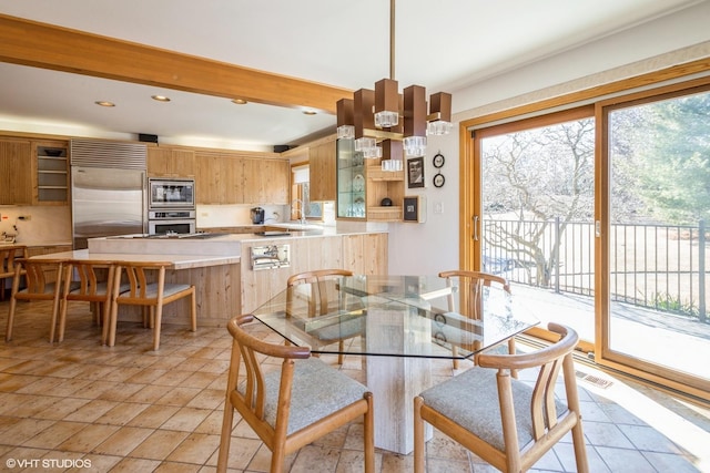 dining area with recessed lighting, visible vents, and beamed ceiling