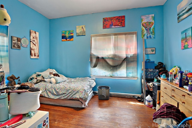 bedroom featuring wood-type flooring