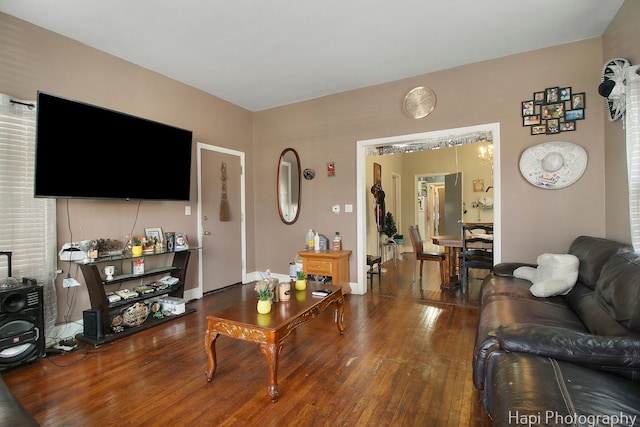 living room with baseboards and hardwood / wood-style floors