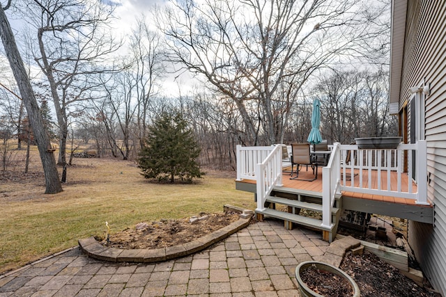 view of yard featuring a wooden deck