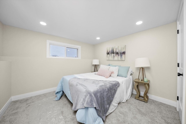 carpeted bedroom featuring recessed lighting and baseboards