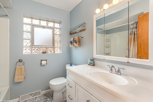 full bath with a healthy amount of sunlight, visible vents, toilet, and vanity