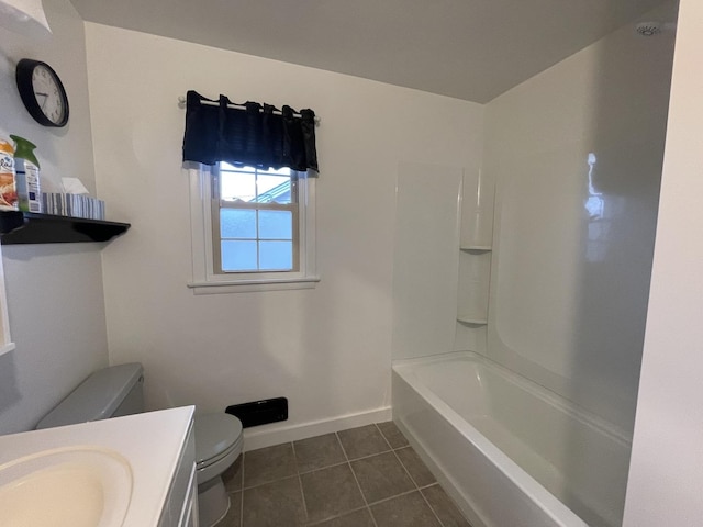 full bath with baseboards, vanity, toilet, and tile patterned floors