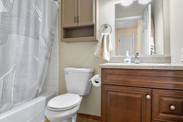 full bathroom featuring vanity, toilet, and shower / tub combo with curtain