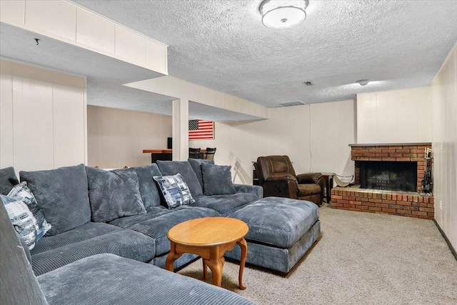 carpeted living room featuring visible vents, a textured ceiling, and a fireplace